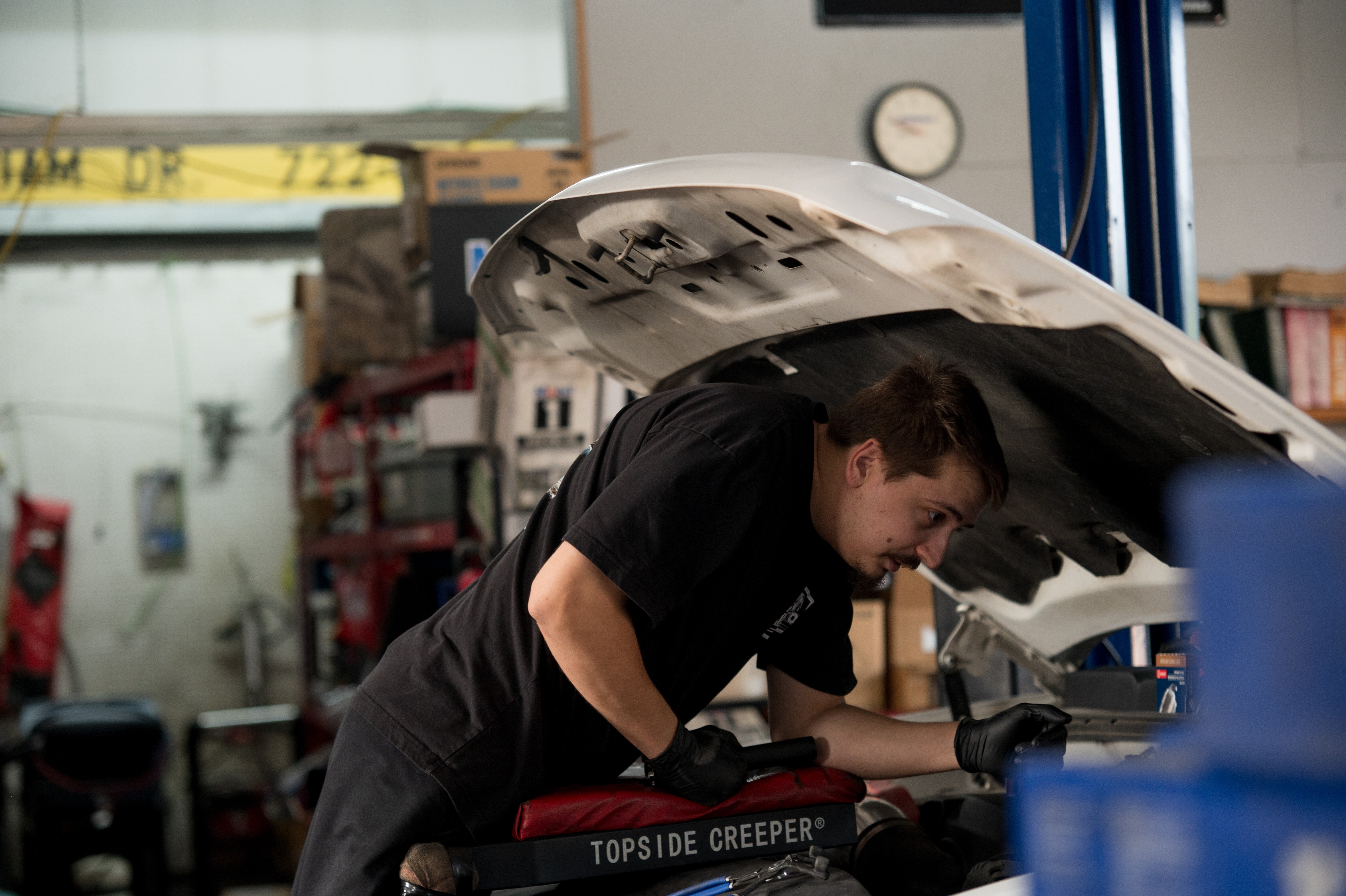 Technician working on a car