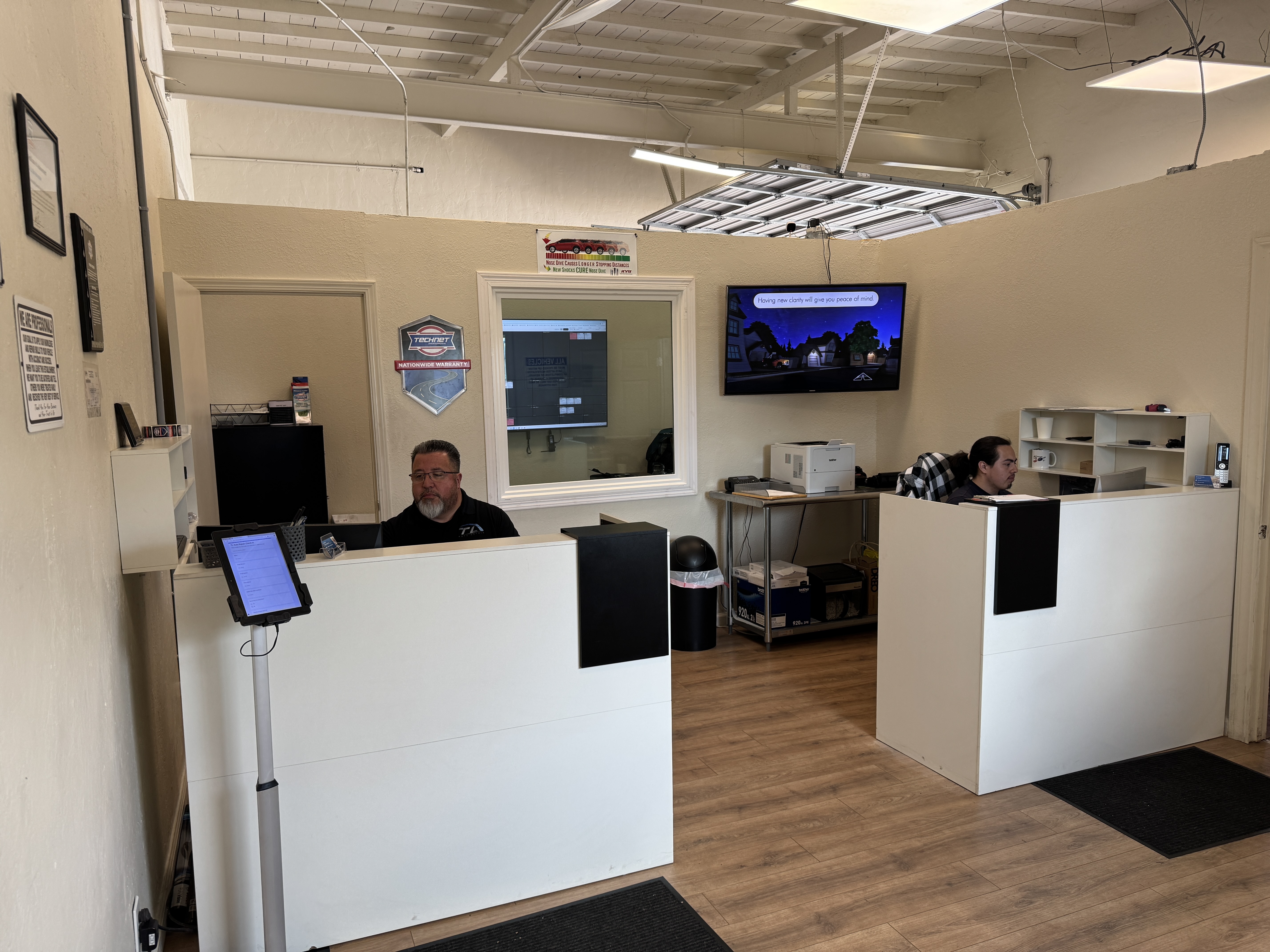 Service Advisors at their desks